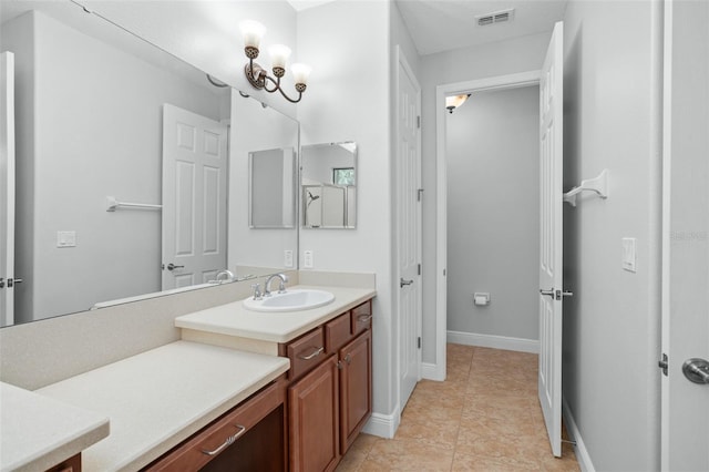 bathroom featuring vanity and tile patterned flooring