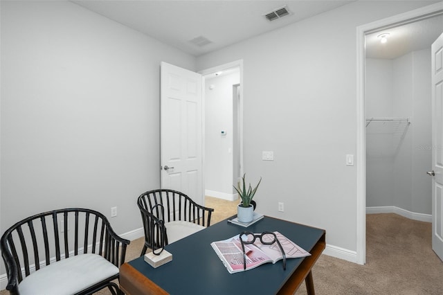 view of carpeted dining space