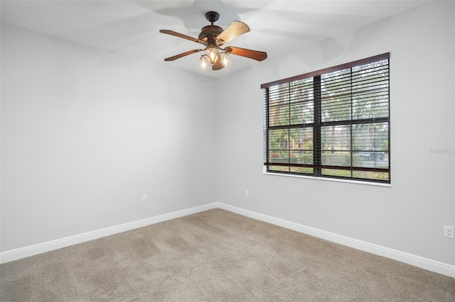 unfurnished room with carpet floors and ceiling fan