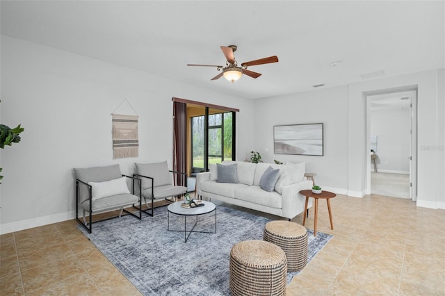 800 Ebb Tide Ln, Kissimmee, FL 34759 - living room with baseboards and a ceiling fan