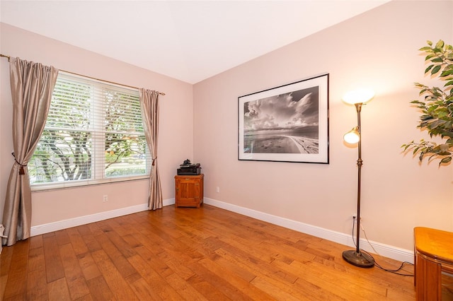 spare room featuring light hardwood / wood-style floors