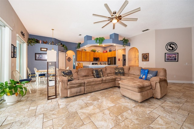 living room featuring ceiling fan