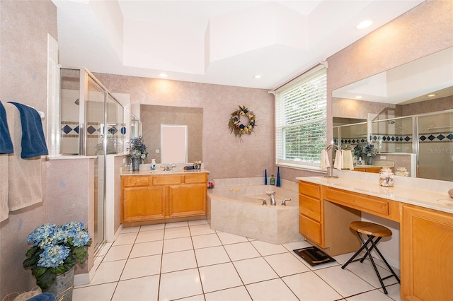 bathroom with plus walk in shower, tile patterned floors, a tray ceiling, and vanity