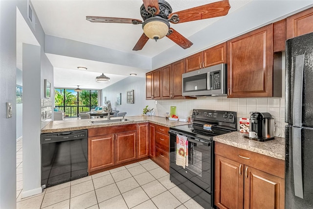 kitchen with ceiling fan, black appliances, decorative backsplash, sink, and light tile patterned floors