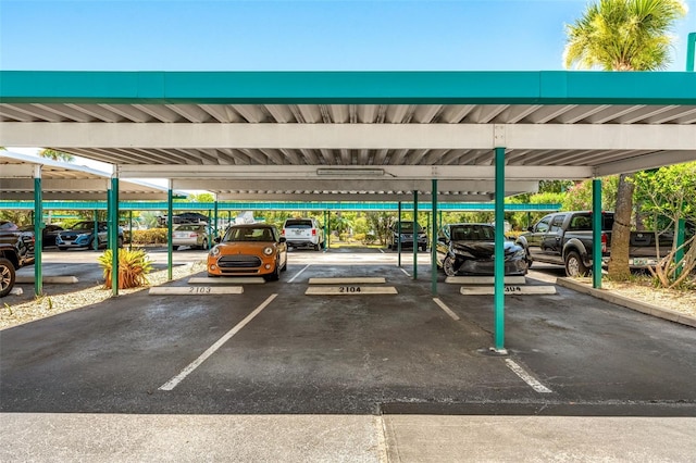 view of parking with a carport