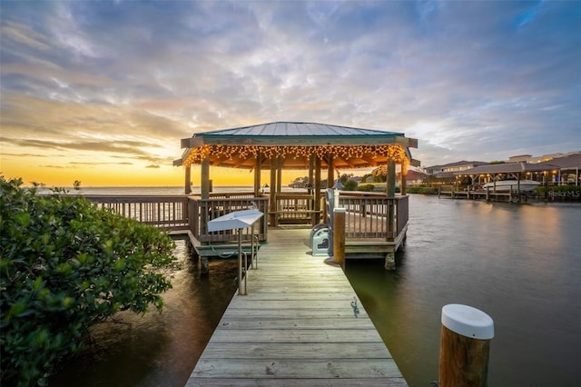 dock area featuring a water view and a gazebo