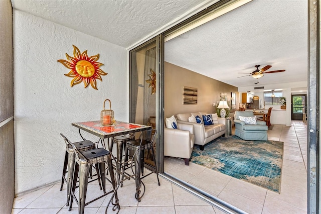 sunroom / solarium with ceiling fan