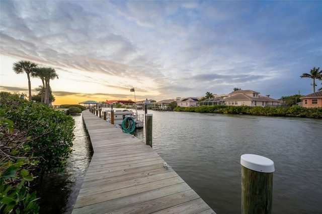 dock area featuring a water view