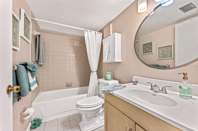 full bathroom with vanity, tile patterned floors, toilet, and shower / bath combo with shower curtain