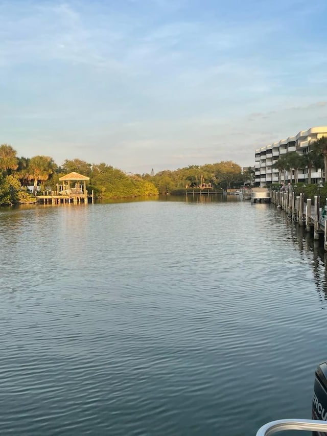 property view of water featuring a dock