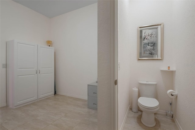 bathroom featuring toilet