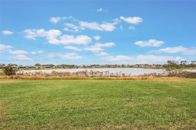 view of yard with a water view