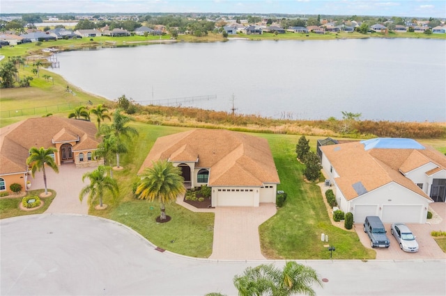 birds eye view of property featuring a water view