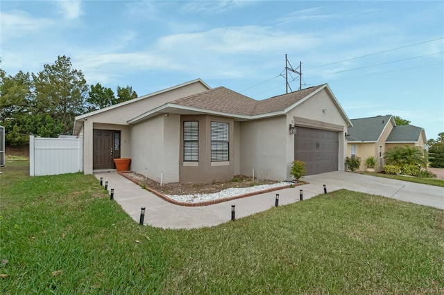 ranch-style house with a front lawn and a garage