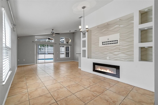 unfurnished living room featuring ceiling fan and light tile patterned floors