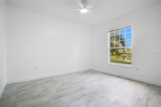 empty room featuring ceiling fan