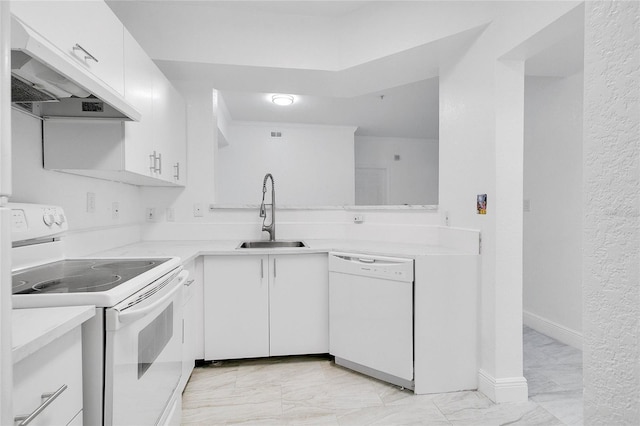 kitchen featuring white cabinetry, sink, white appliances, and custom exhaust hood