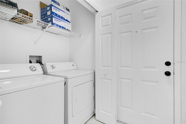 clothes washing area with independent washer and dryer