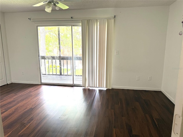 5123 Picadilly Circus Ct Unit 2, Orlando, FL 32839 - unfurnished room with a ceiling fan, dark wood-style floors, and baseboards