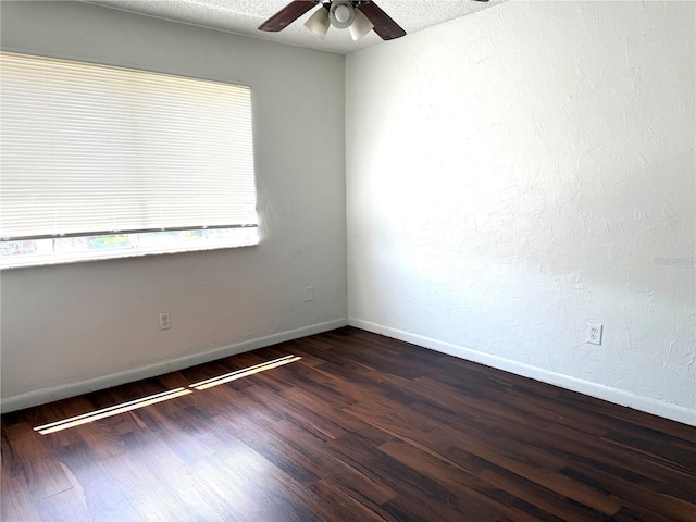 5123 Picadilly Circus Ct Unit 2, Orlando, FL 32839 - unfurnished room featuring ceiling fan, dark wood-style flooring, and baseboards