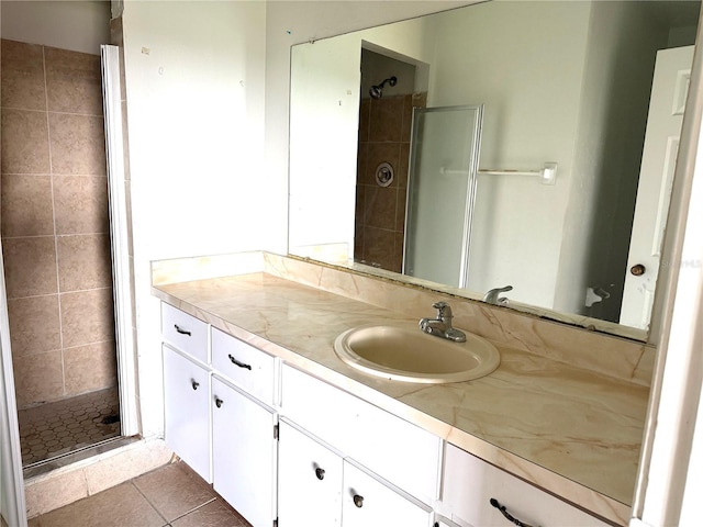 5123 Picadilly Circus Ct Unit 2, Orlando, FL 32839 - bathroom with a stall shower, vanity, and tile patterned flooring
