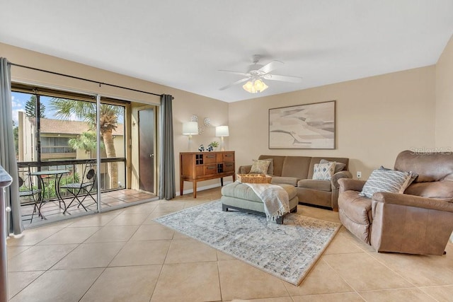 tiled living room with ceiling fan