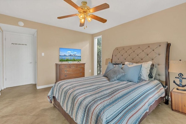 bedroom featuring ceiling fan and light tile patterned flooring