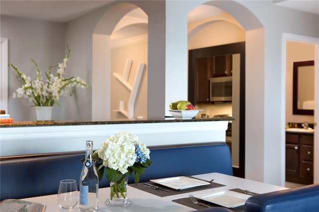 dining room featuring sink