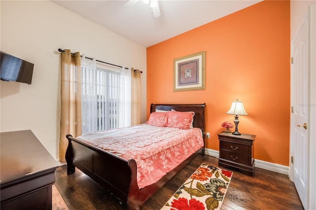 bedroom with ceiling fan and dark wood-type flooring