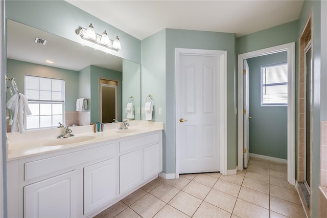 bathroom featuring tile patterned floors and vanity