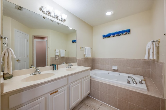 bathroom featuring tile patterned floors, vanity, and plus walk in shower