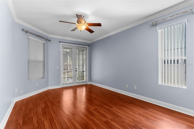 unfurnished room featuring ornamental molding, french doors, hardwood / wood-style flooring, and ceiling fan