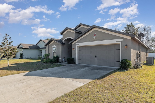 single story home with a garage, central air condition unit, and a front yard