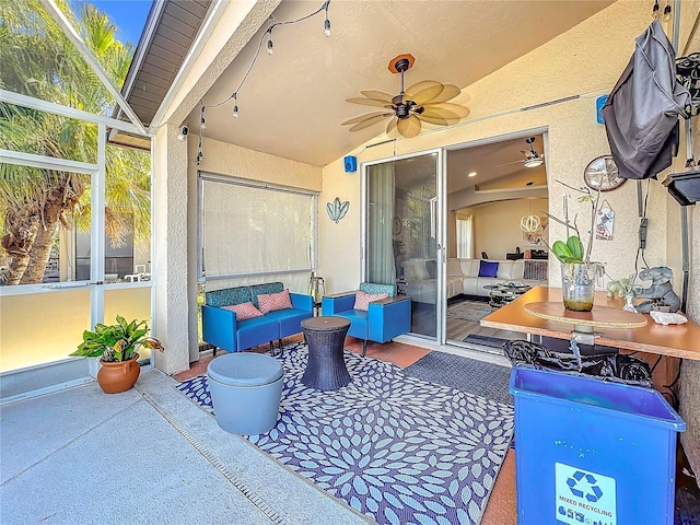 view of patio featuring ceiling fan and an outdoor living space