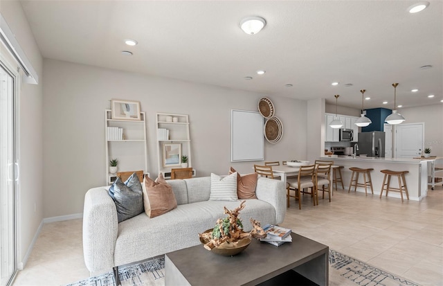 living room with light tile patterned floors