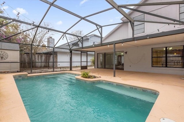 view of pool with a lanai and a patio