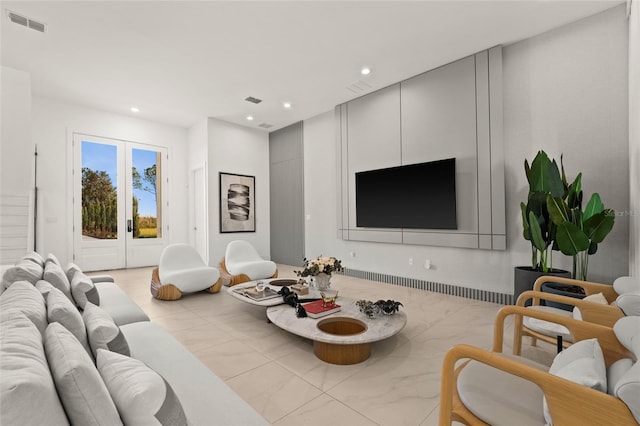 living room with light tile patterned floors and french doors