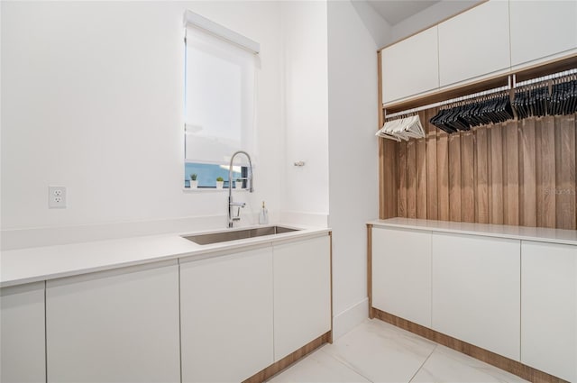 bathroom featuring sink and tile patterned floors