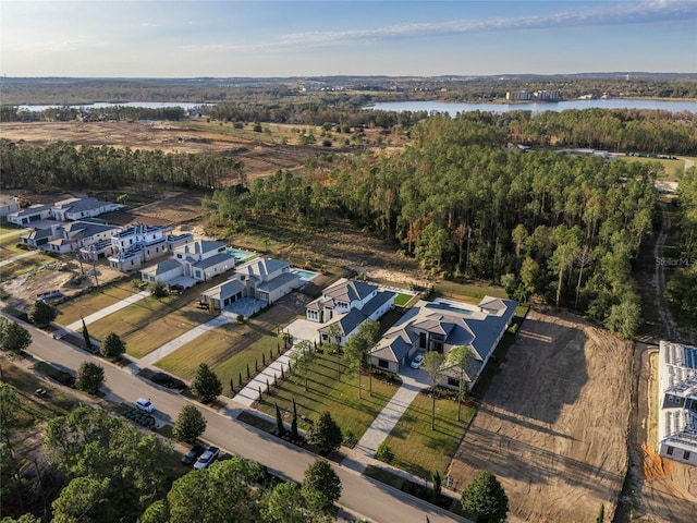 drone / aerial view with a water view