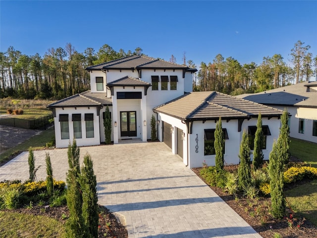 view of front of home with a garage