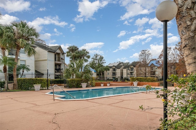 view of pool featuring a patio