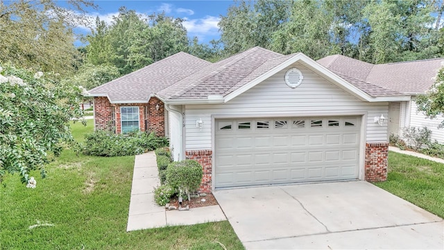 ranch-style house with a front yard and a garage