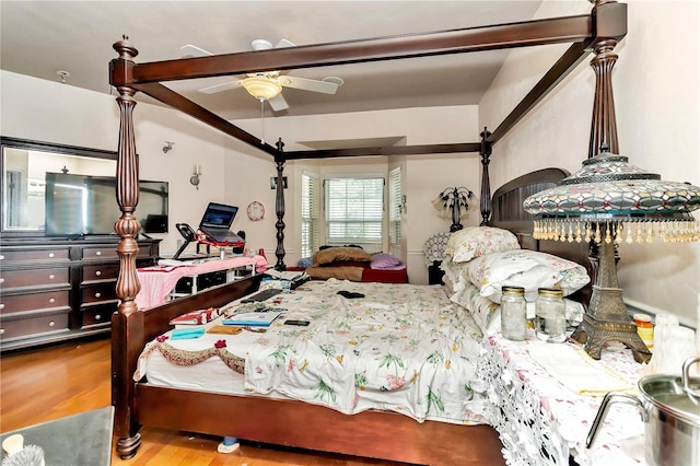bedroom featuring ceiling fan and wood-type flooring
