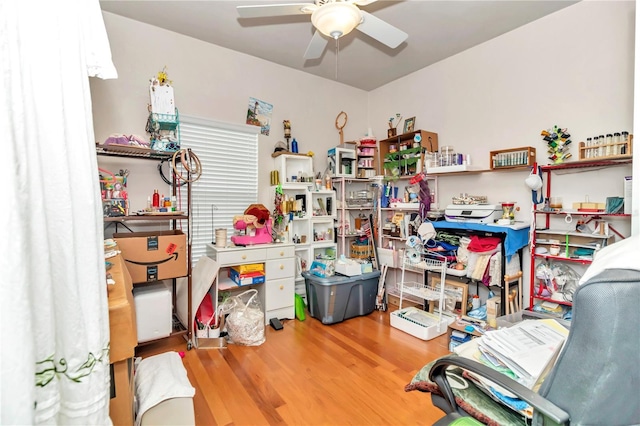 interior space featuring ceiling fan and hardwood / wood-style flooring