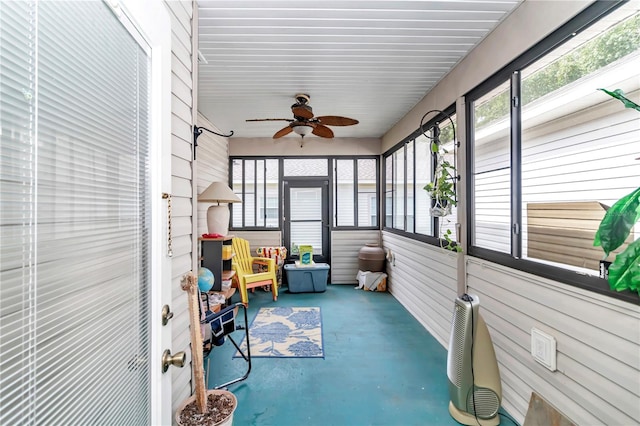 sunroom / solarium with ceiling fan