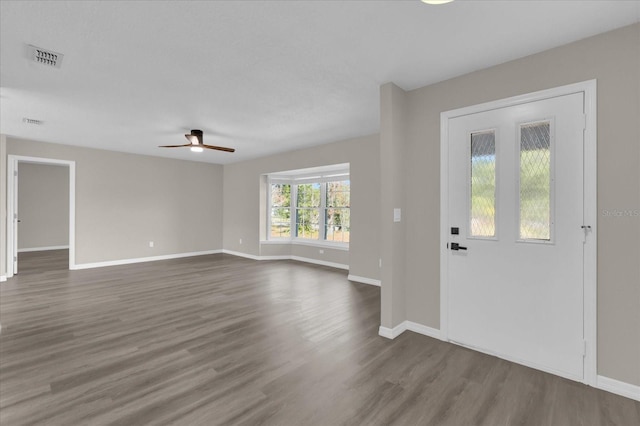 entrance foyer featuring ceiling fan and dark hardwood / wood-style flooring