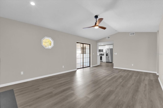 unfurnished living room with ceiling fan, vaulted ceiling, and hardwood / wood-style flooring