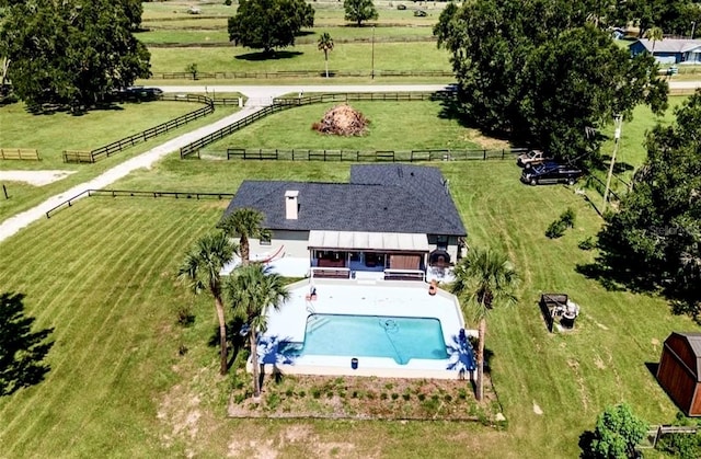 birds eye view of property featuring a rural view