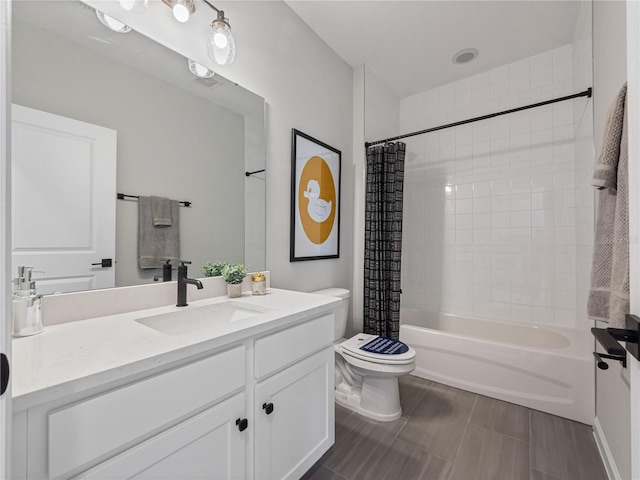 full bathroom featuring toilet, vanity, and shower / bath combo with shower curtain