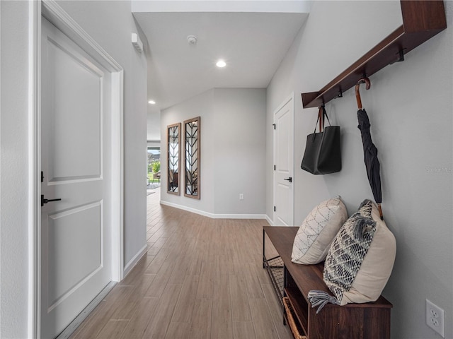 hall with light wood-type flooring